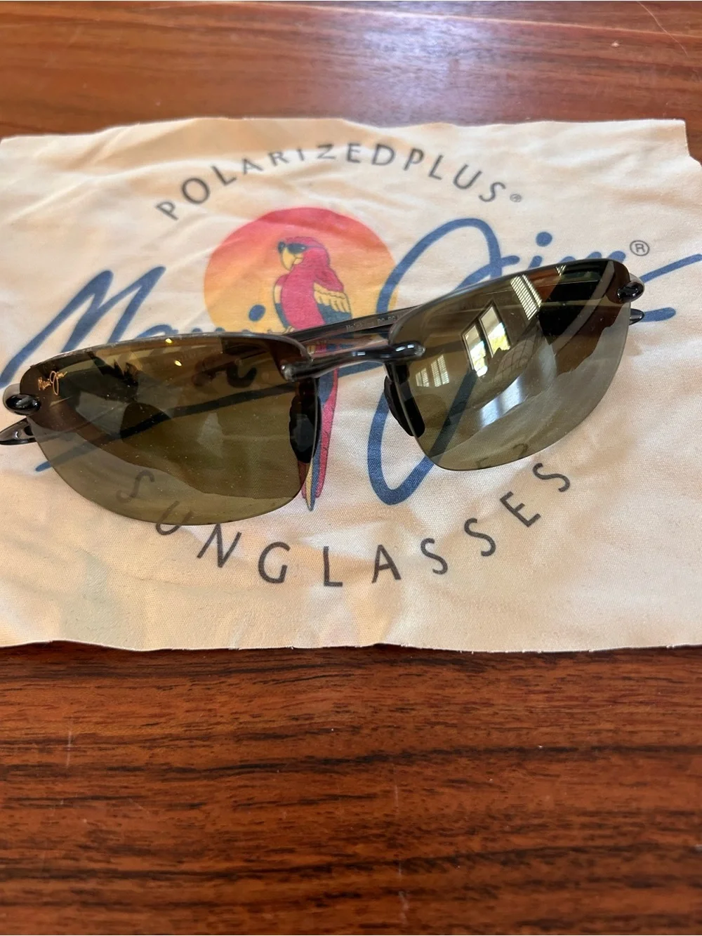 Maui Jim Ho'okipa Titanium Rimless sunglasses with Brown Lenses with case/ cloth